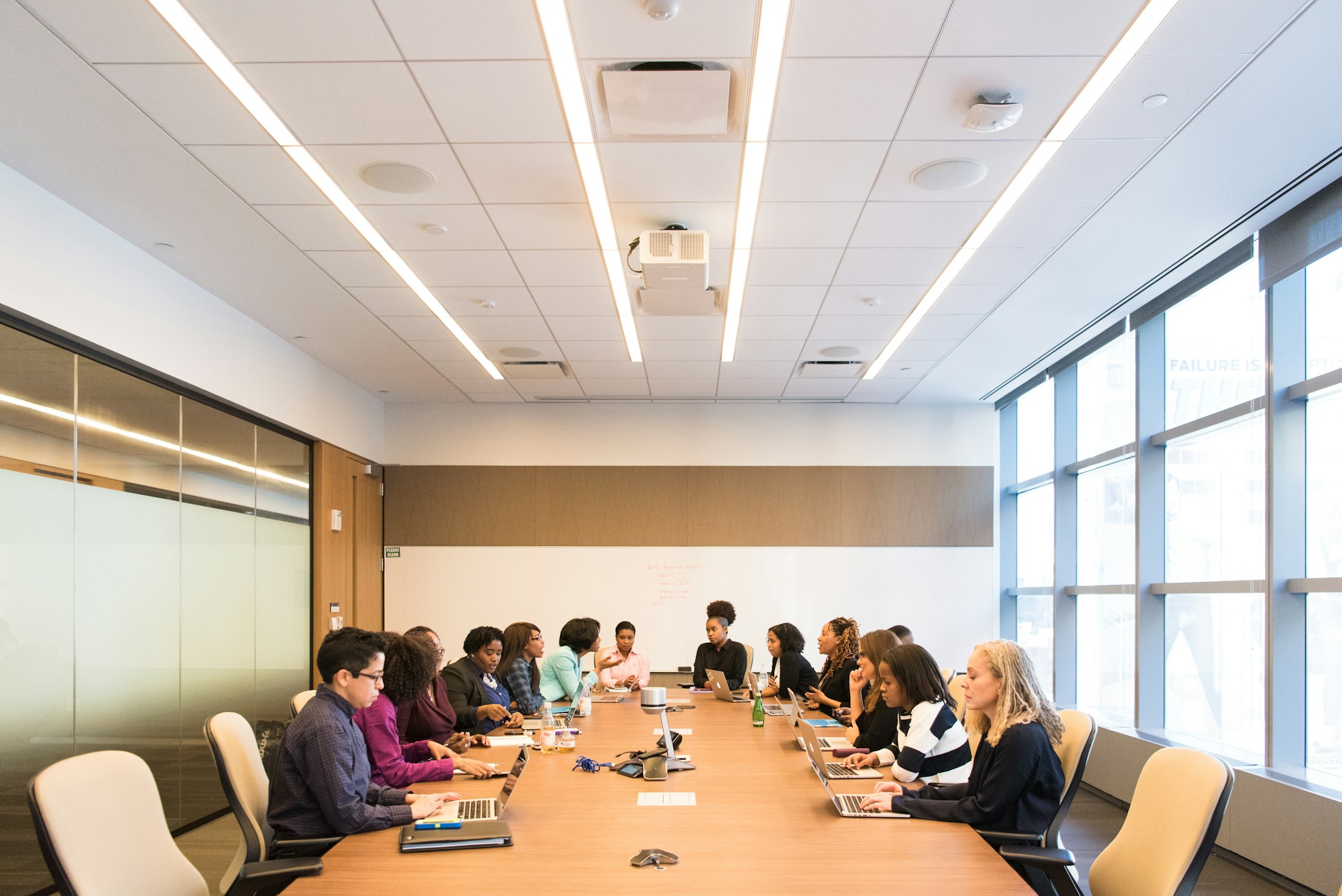 Team meeting around a conference table.