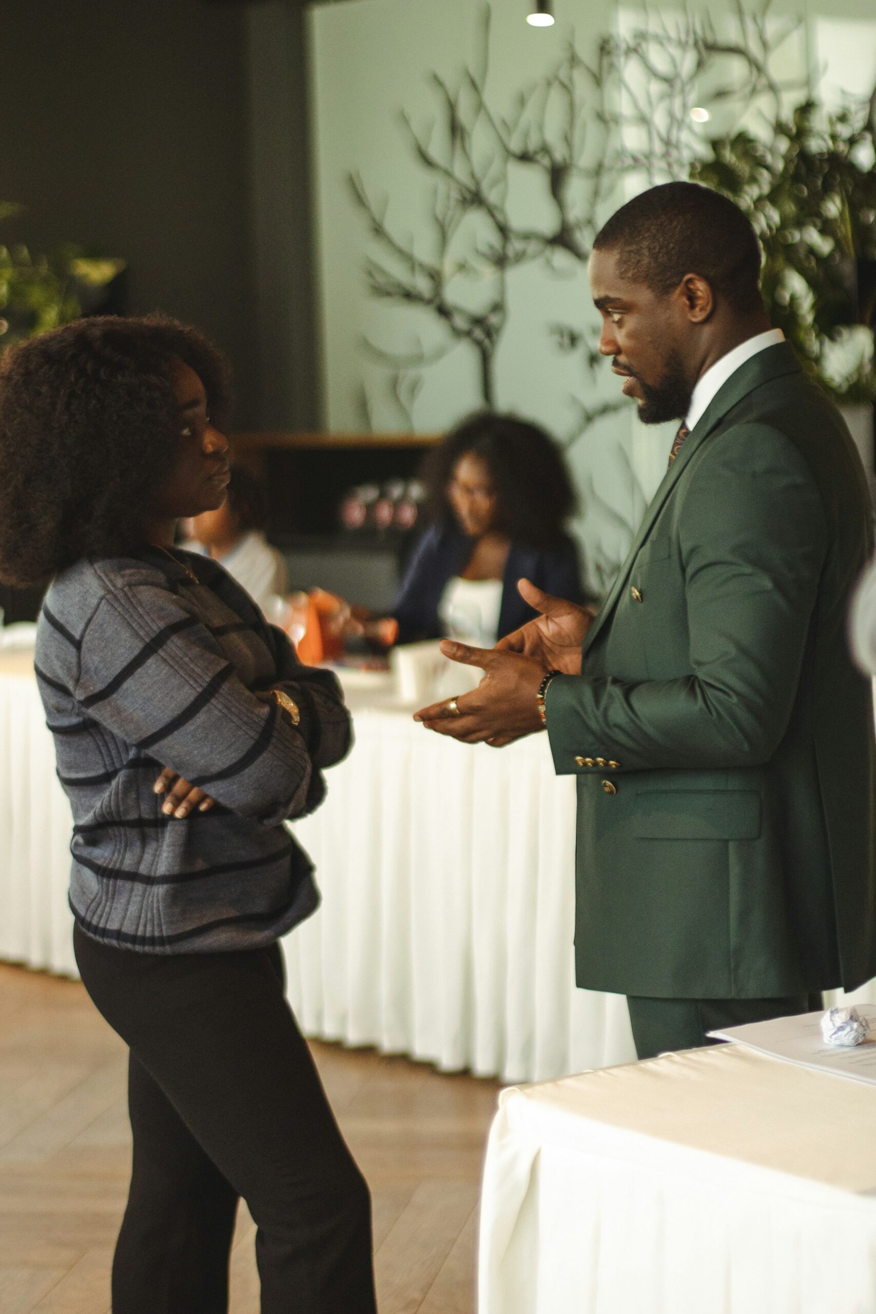 Two professionals in conversation.